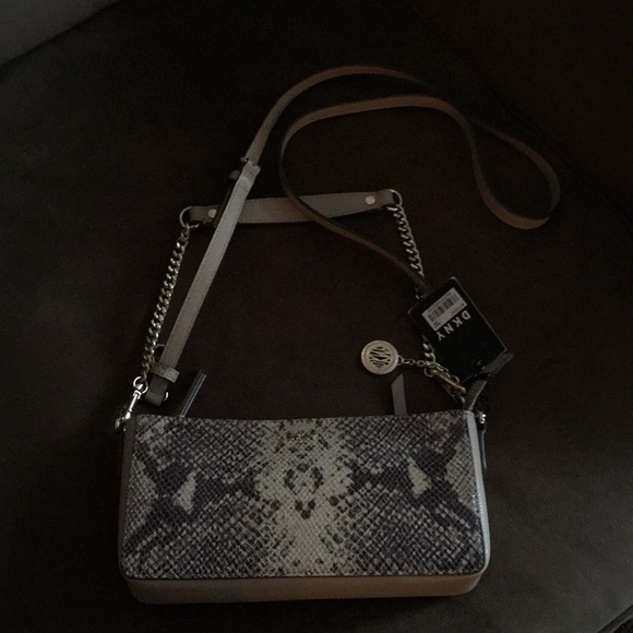Michael Kors Handbags - ‼️SALE👜DKNY Animal print cross body bag. NWT Michael Kors Handbags - ‼️SALE👜DKNY Animal print cross body bag. NWT